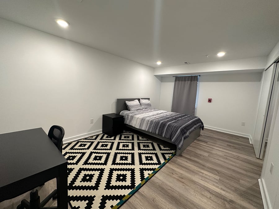Unit 1 Spacious primary bedroom 1 with en suite bathroom and 2 walk in closets!