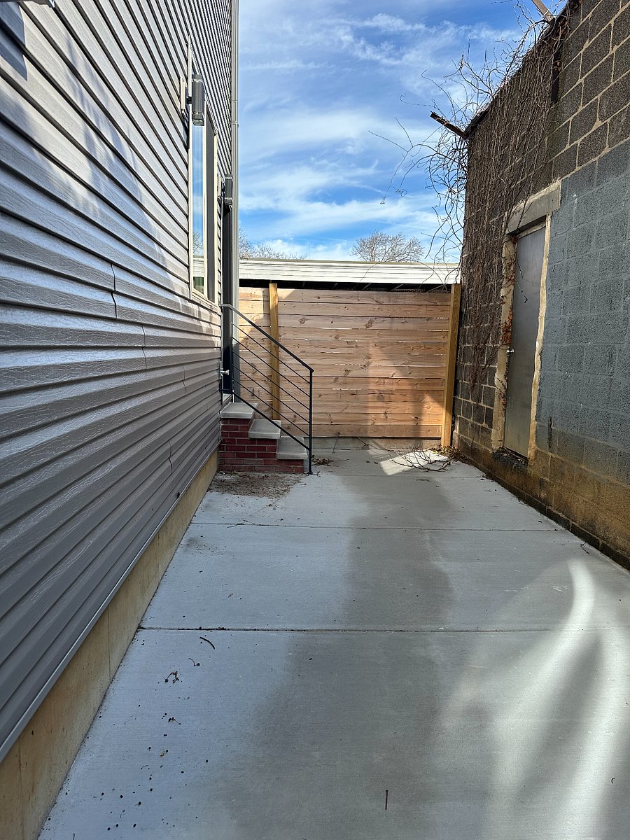 Unit 1 fenced in back yard