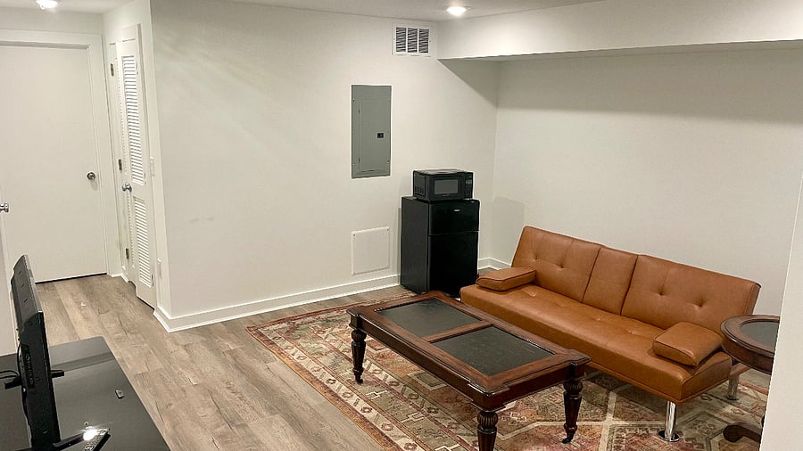 Unit 1 Basement den with mini fridge/microwave.