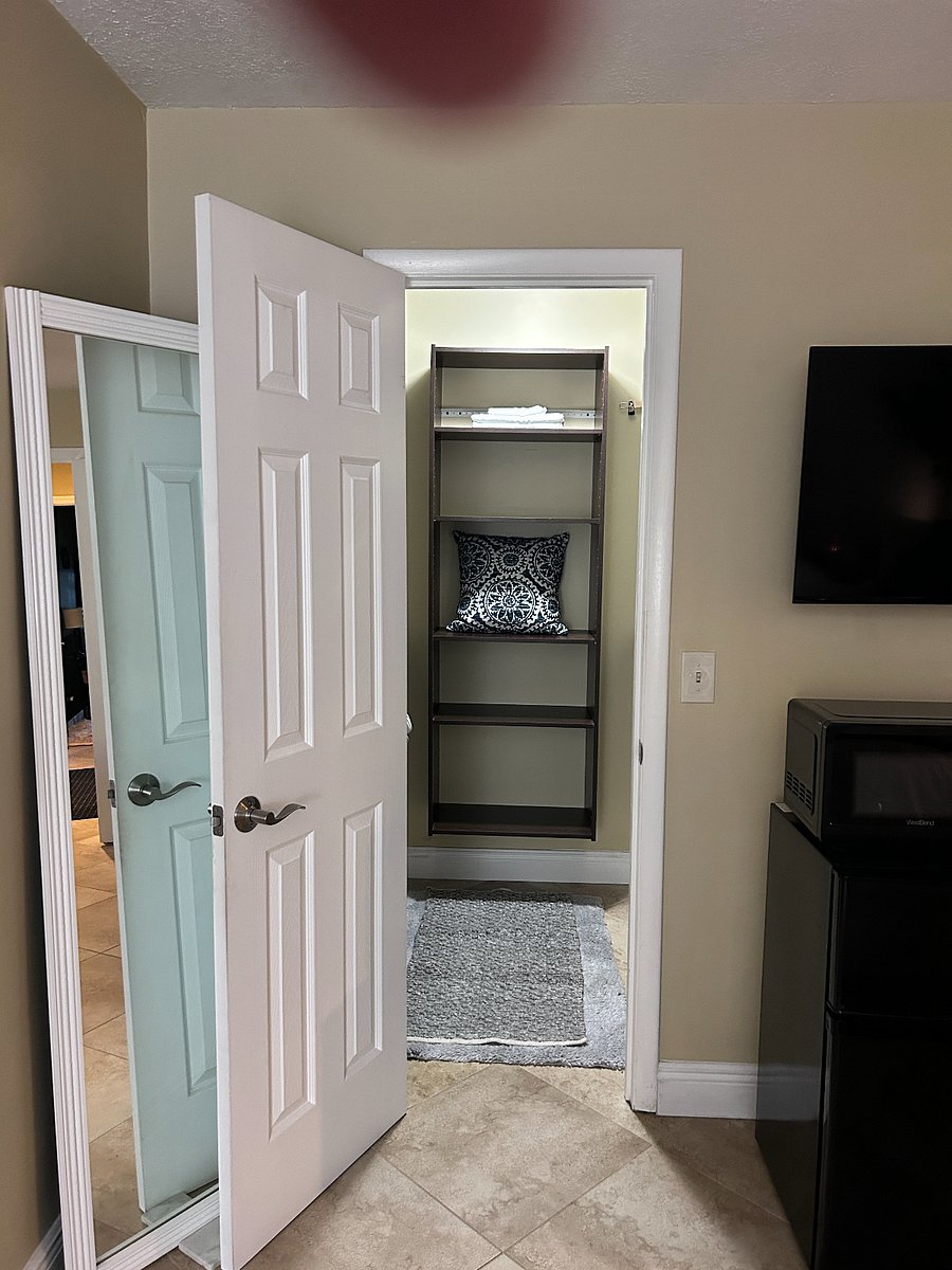 walk in closet with 2 sides for hanging or storage