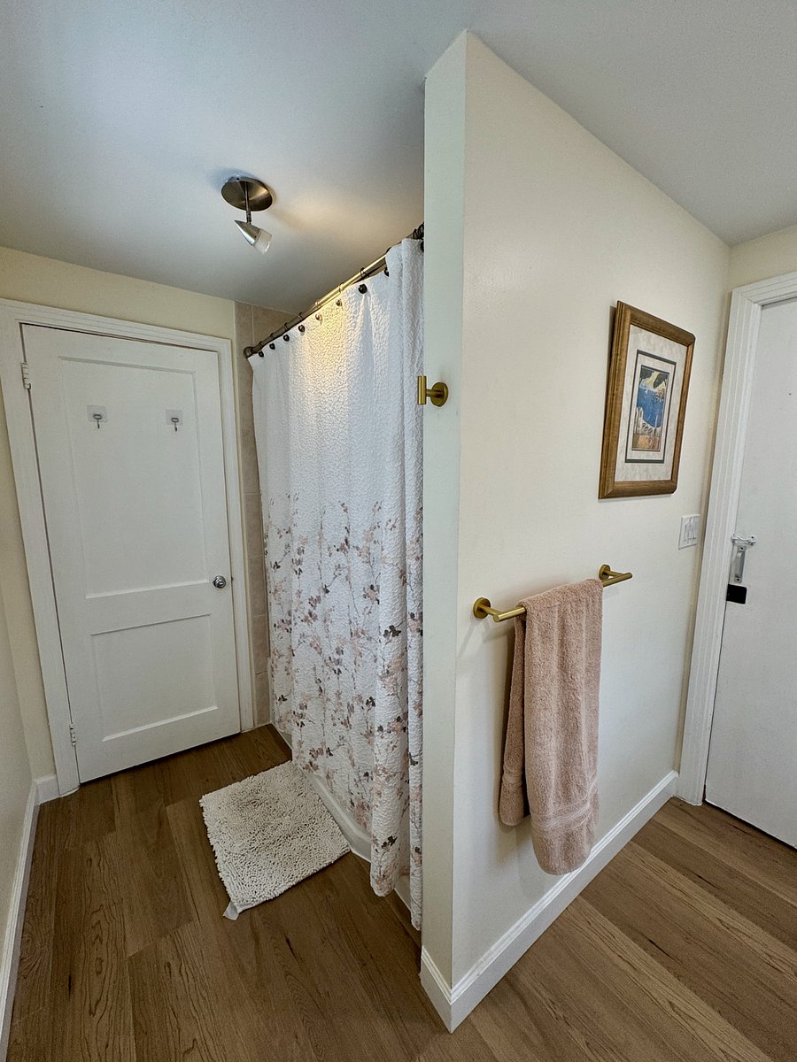Alcove tub area offers privacy in Jack n Jill full bath