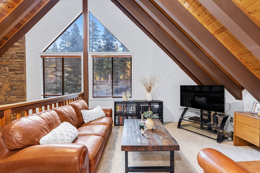 Loft with sofa, lazy boy, and smart tv