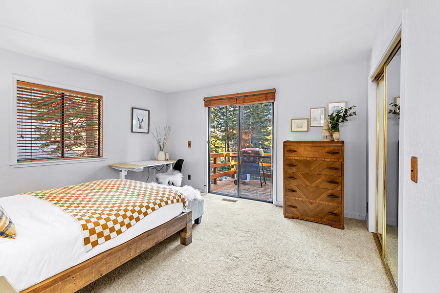 Downstairs bedroom 1 with access to back deck
