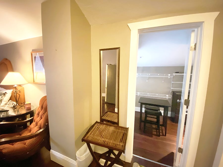 Bedroom looking into huge walk-in closet