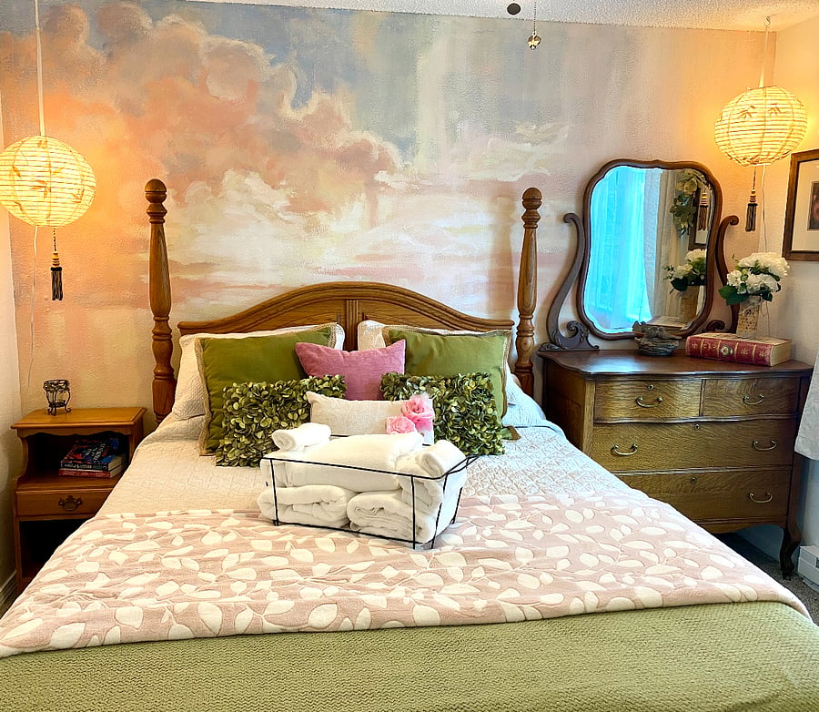 The front bedroom, the Garden Room is furnished with a new, comfy queen-sized mattress, and black out curtains to help you have a restful stay.