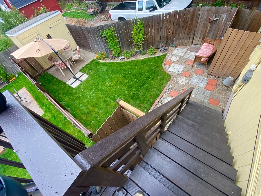 The deck leads down to your privately fenced backyard. (The stairs are NOT as steep as they seem to look in this photo!)