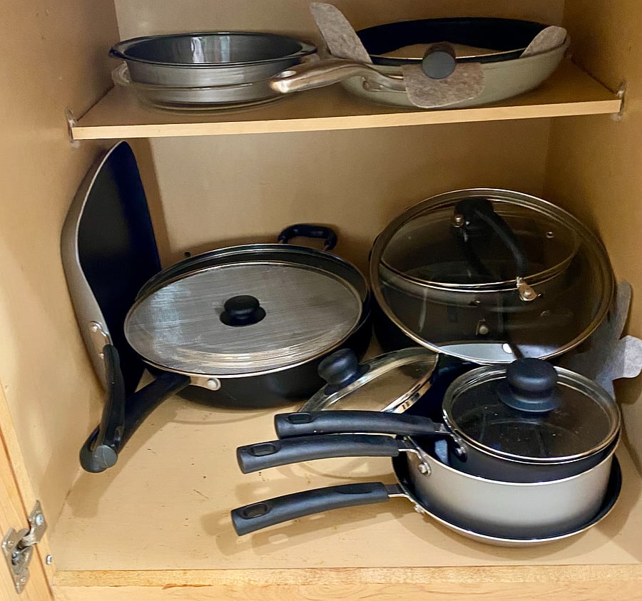 Lots of pots and pans for cooking a great meal.