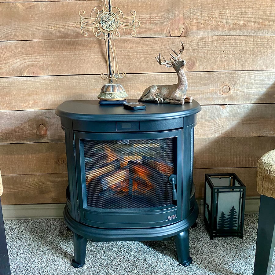 Cozy electric fireplace and decor.