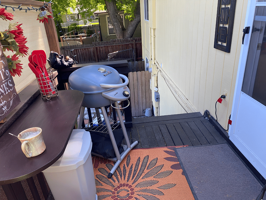 Cozy deck with BBQ for outdoor cooking, right off the kitchen.