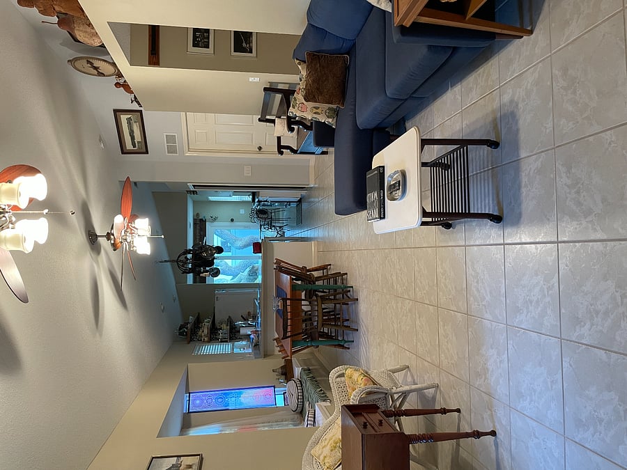 Great room with TV, dining and kitchen views