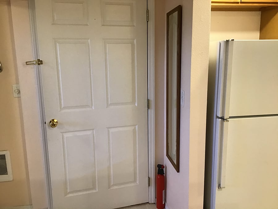 Locking front Door of studio apartment