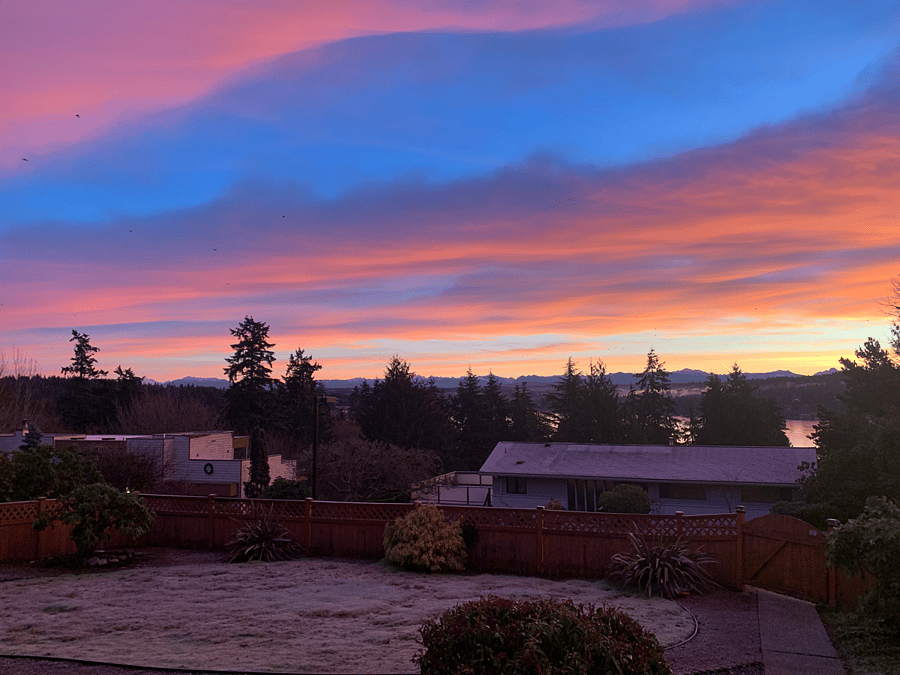 Beautiful early morning sunrise over the lake facing EAST window