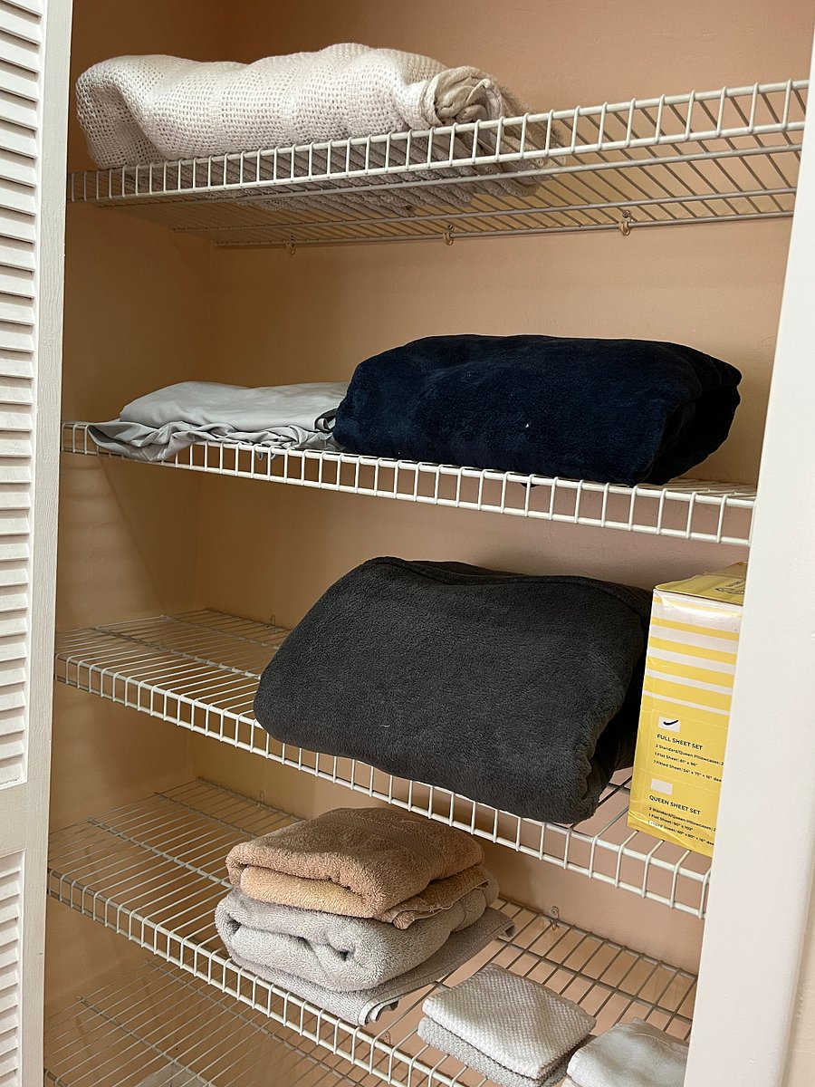 linens in closet across from main bedroom
