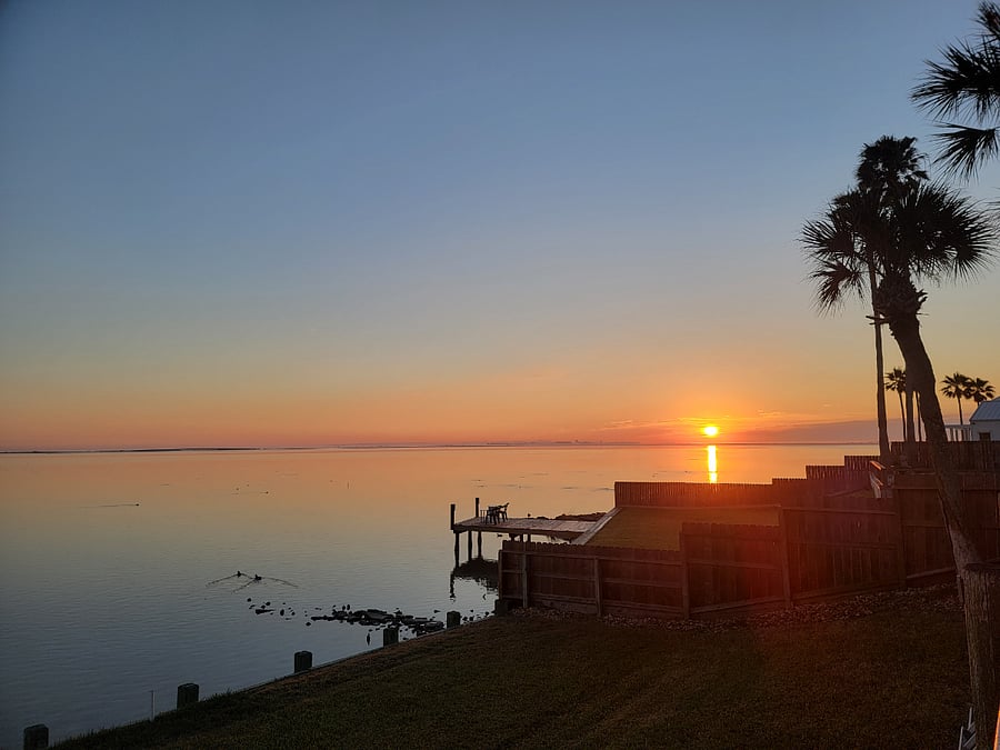 Drink a cup of coffee watching the sun rise.