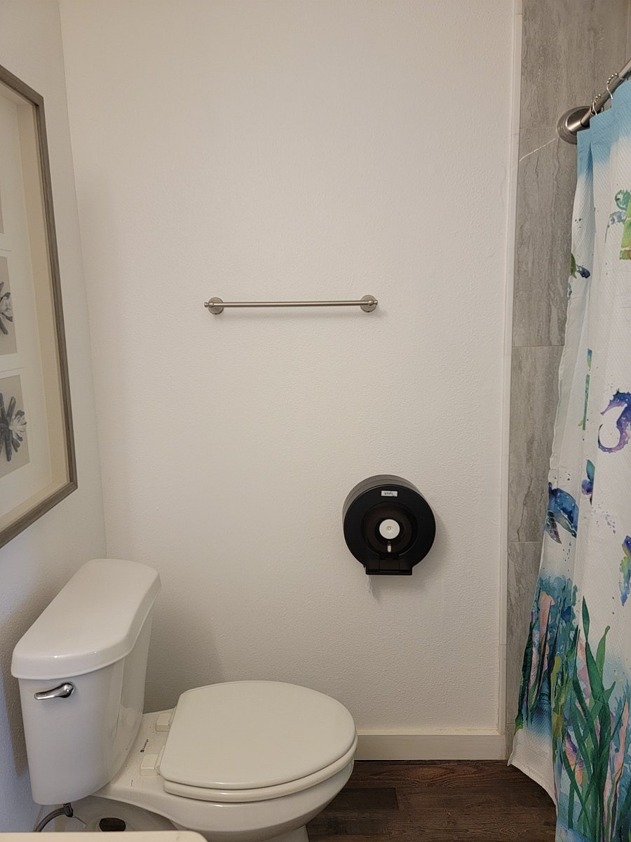 Second bathroom with combo tub and shower