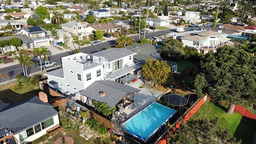 Aerial photo of top apartment unit with decks