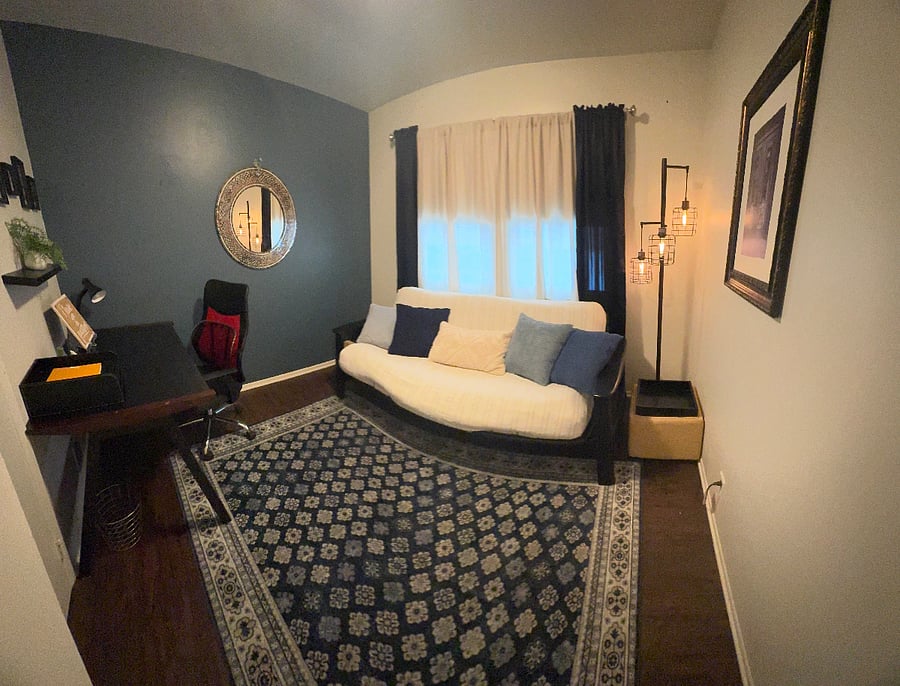 Office bedroom with futon bed.