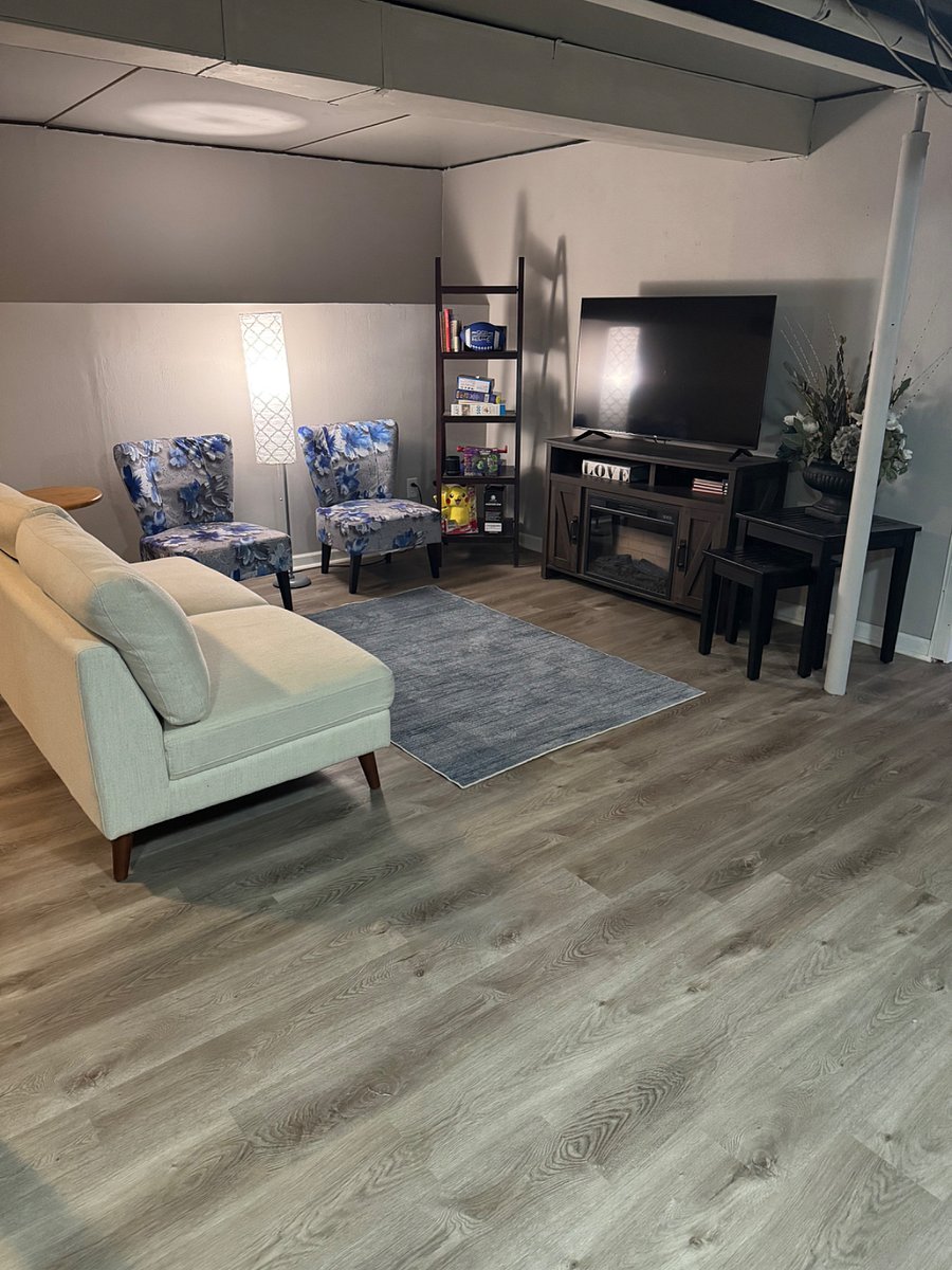 Lower level with smart TV and board games.