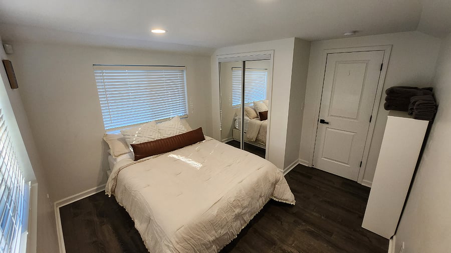 Guest Bedroom - Queen Size Bed with 6 storage drawers, standard closet and shoe storage bins