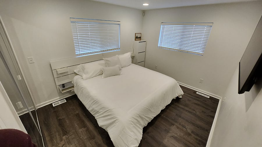 Master Bedroom - King Size Bed with 6 storage drawers and shoe storage.