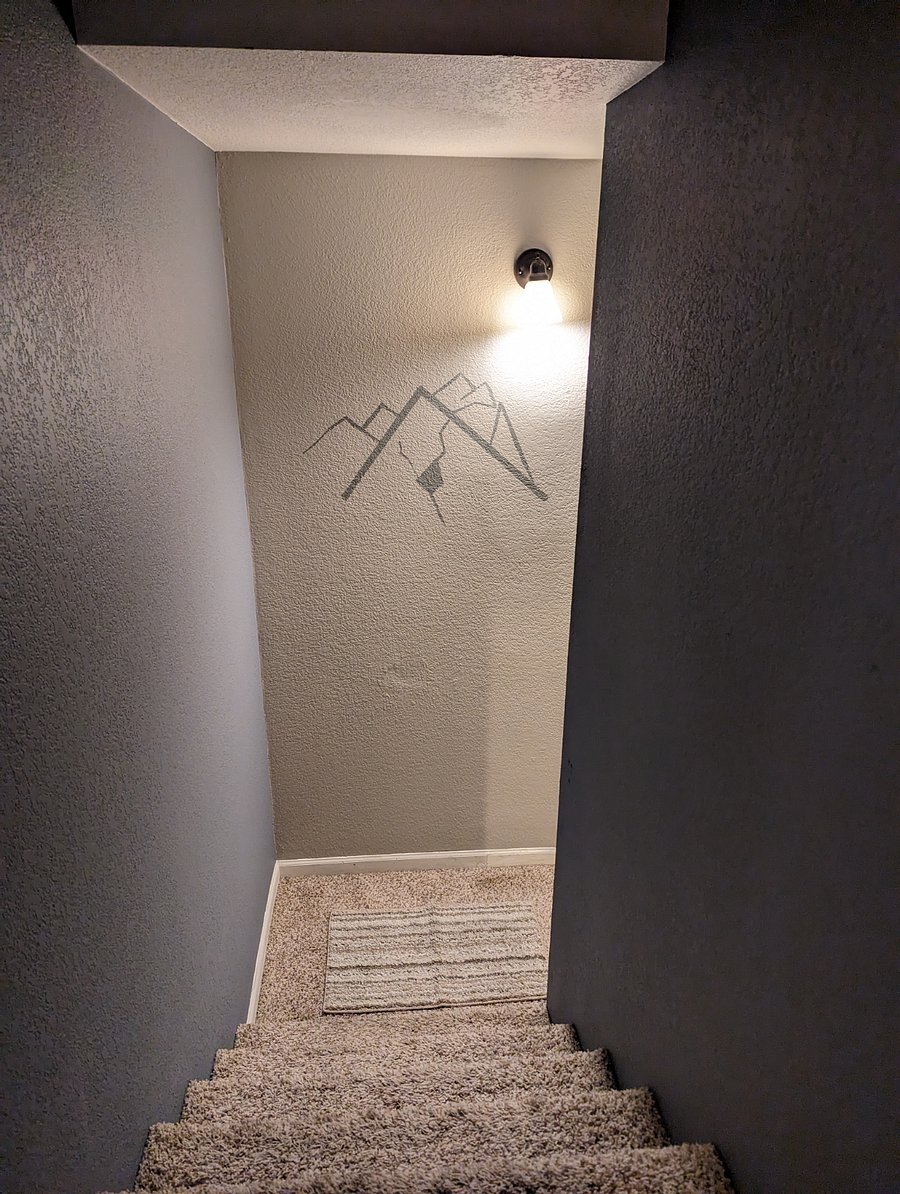 Stairway just inside garage entrance