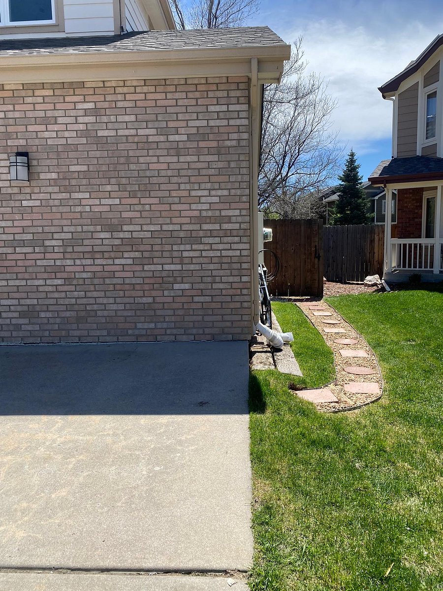 Parking on far right off driveway and path to entrance at rear of garage