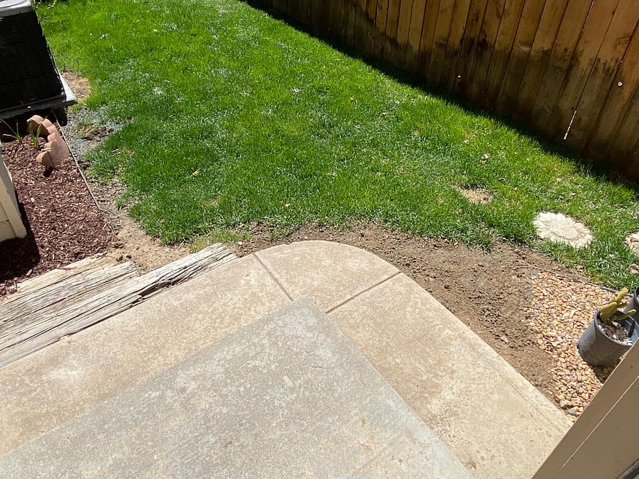 Small, private fenced-in yard. Entrance through the service door of the garage.