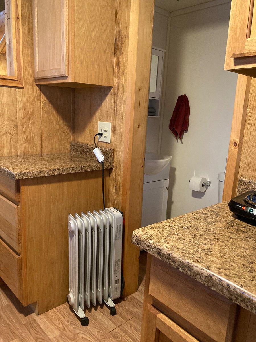 The bathroom is just off the kitchen.