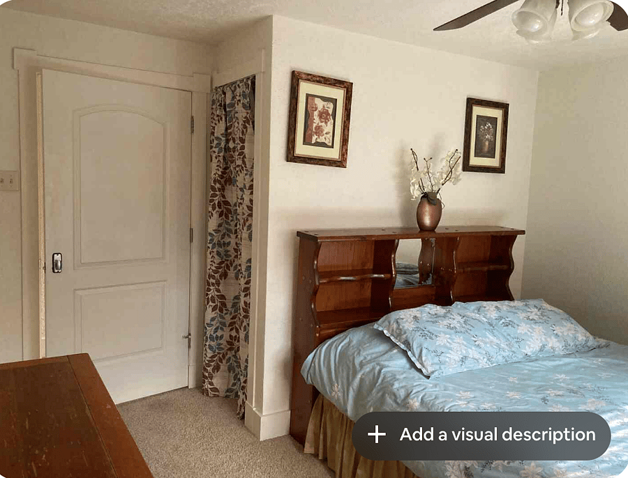 Bedroom with queen bed, dresser and closet.