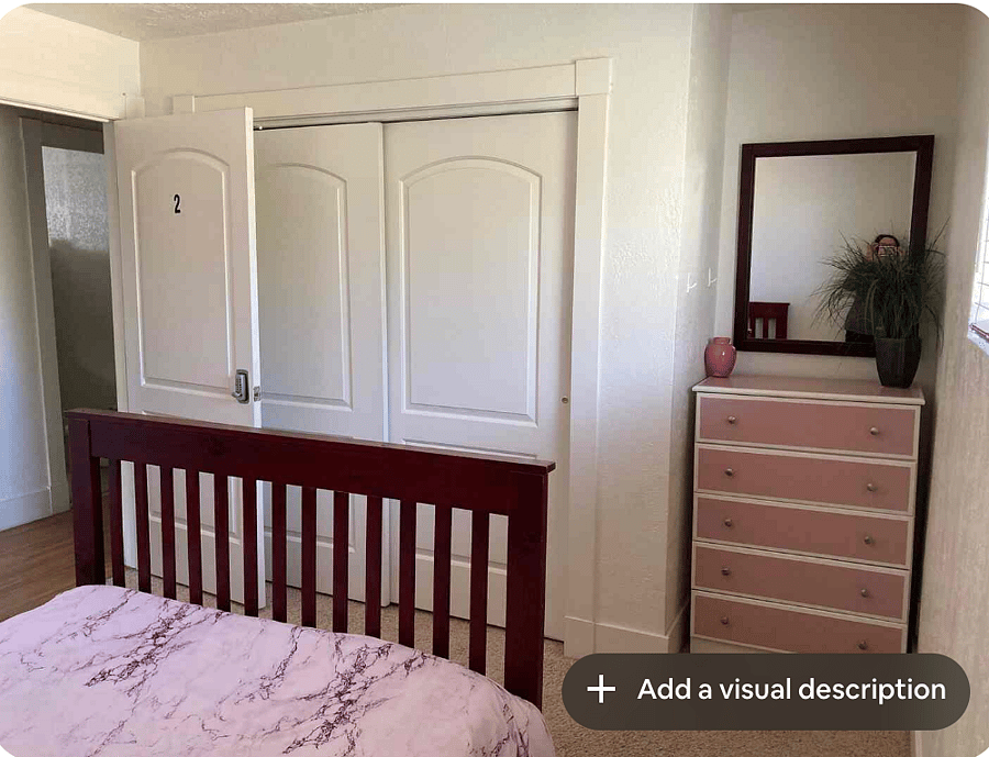 Full sized bed with dresser and closet.