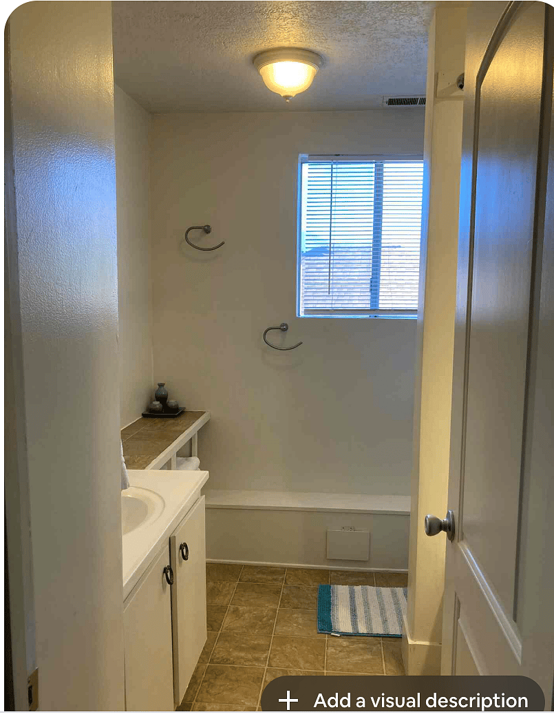 Full bathroom with tub.