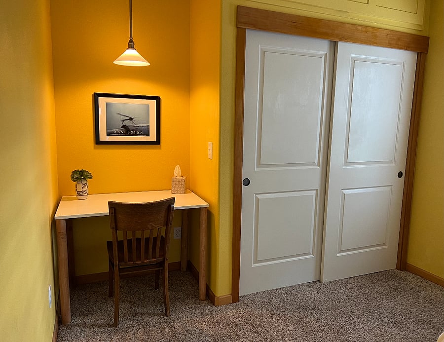 A large closet in the bedroom with shelves and hangers for your belongings.