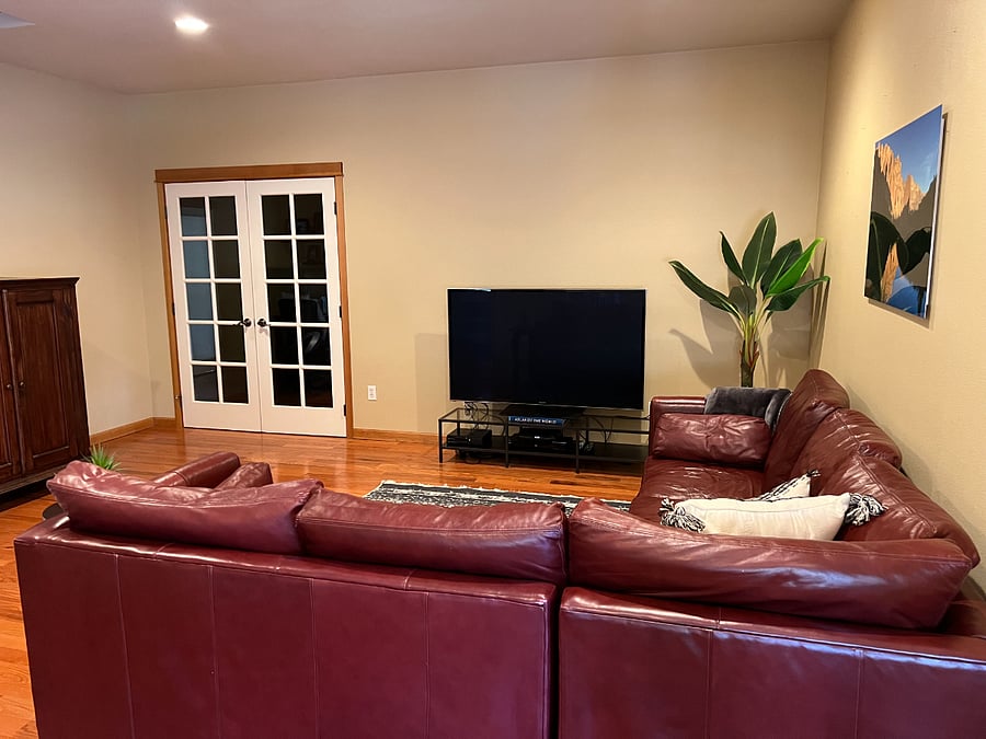 There is a large cabinet to left of doors provided for additional storage.