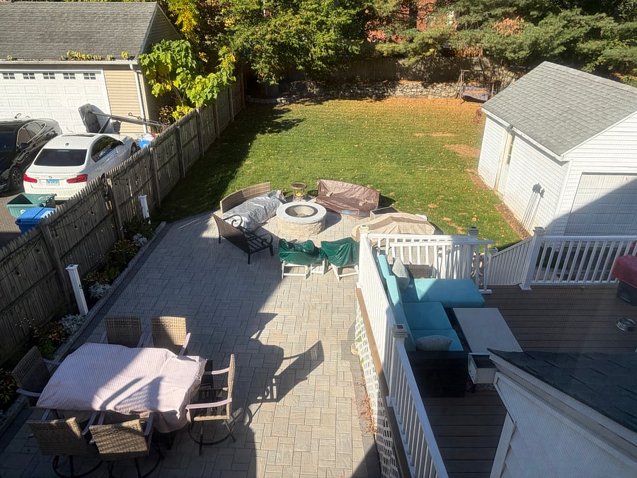 Backyard with two decks,  fire pit , and hot tub.