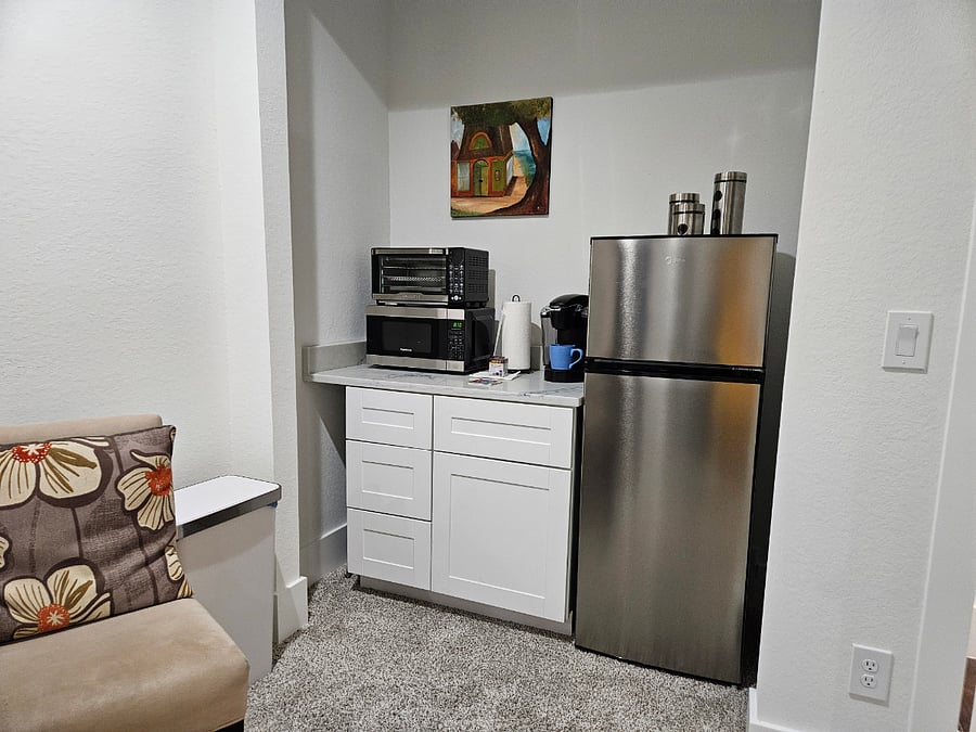 Kitchenette with fridge, micro, air fryer, Keurig.