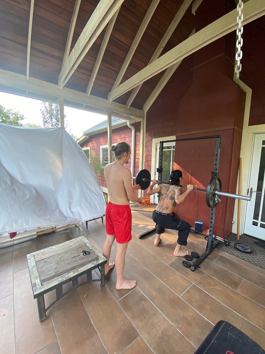We have a home gym on our porch, which you would be welcome to use. Spotting depends on availability ;)