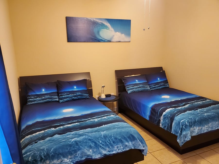 2nd bedroom
contains two full beds