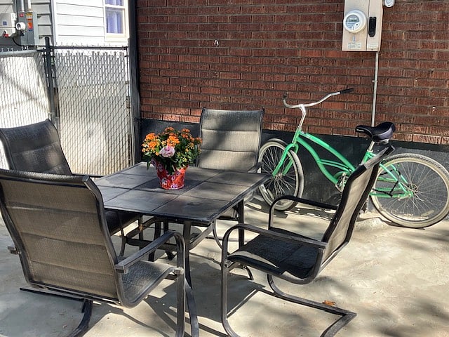 Shared patio table/chairs and BBQ