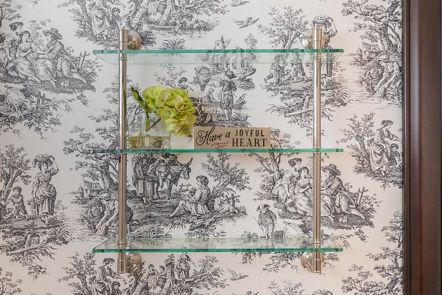 glass shelving beside the sink for your toiletries