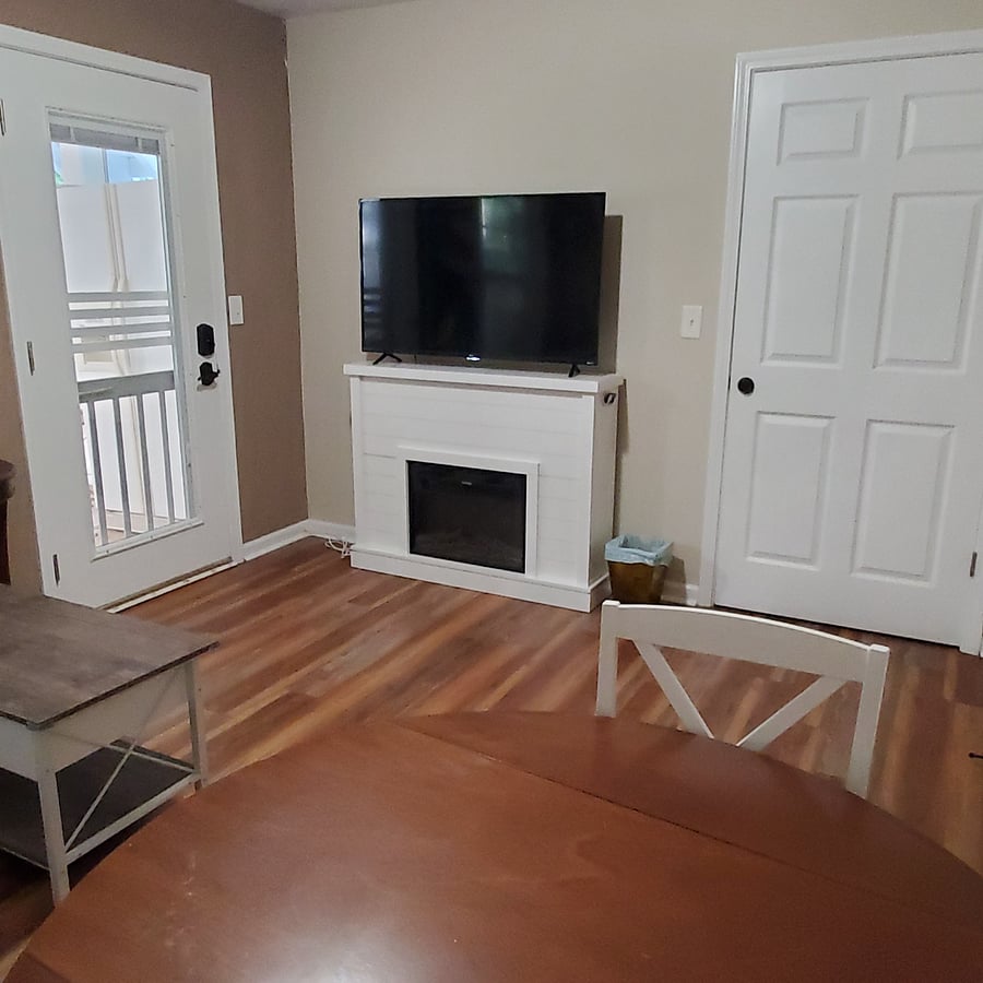 Livingroom with electric fireplace and 50" smart TV