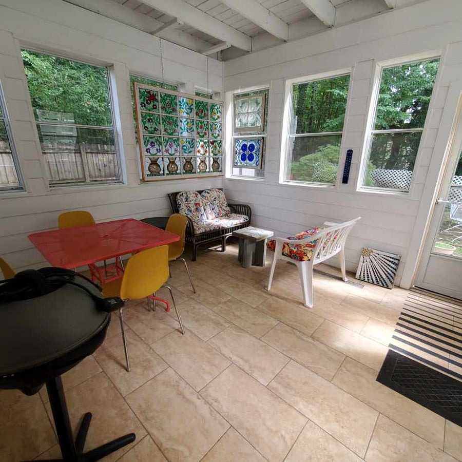 Private-to-you enclosed patio with seating and eating space. (Your private entry is via this patio.)