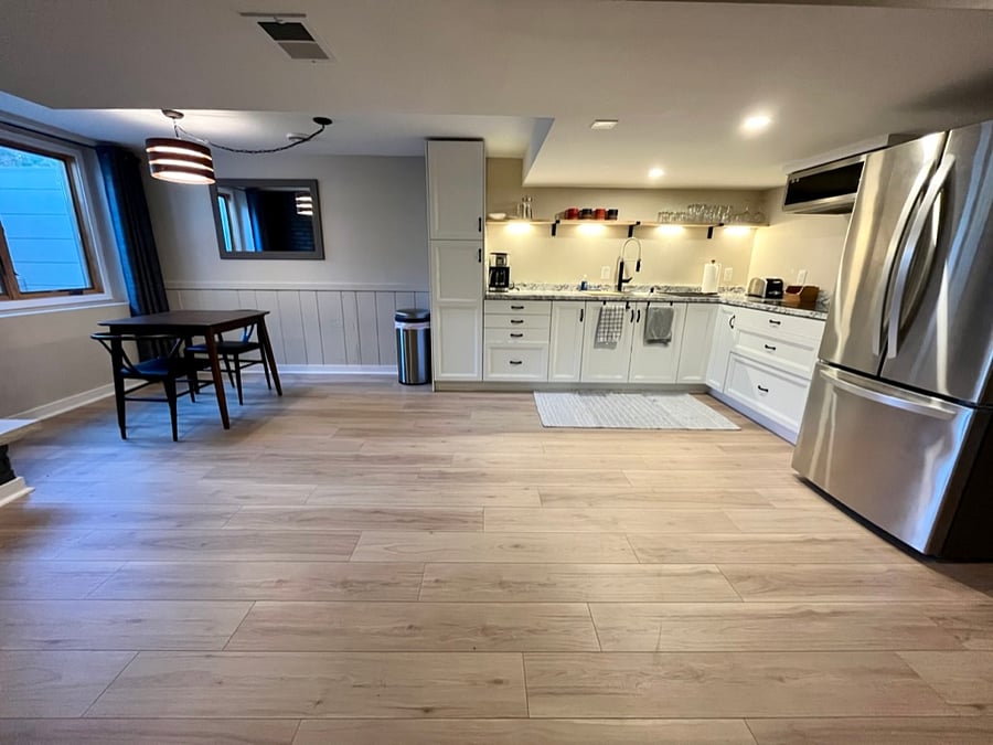 Lower level kitchen/dining, egress window