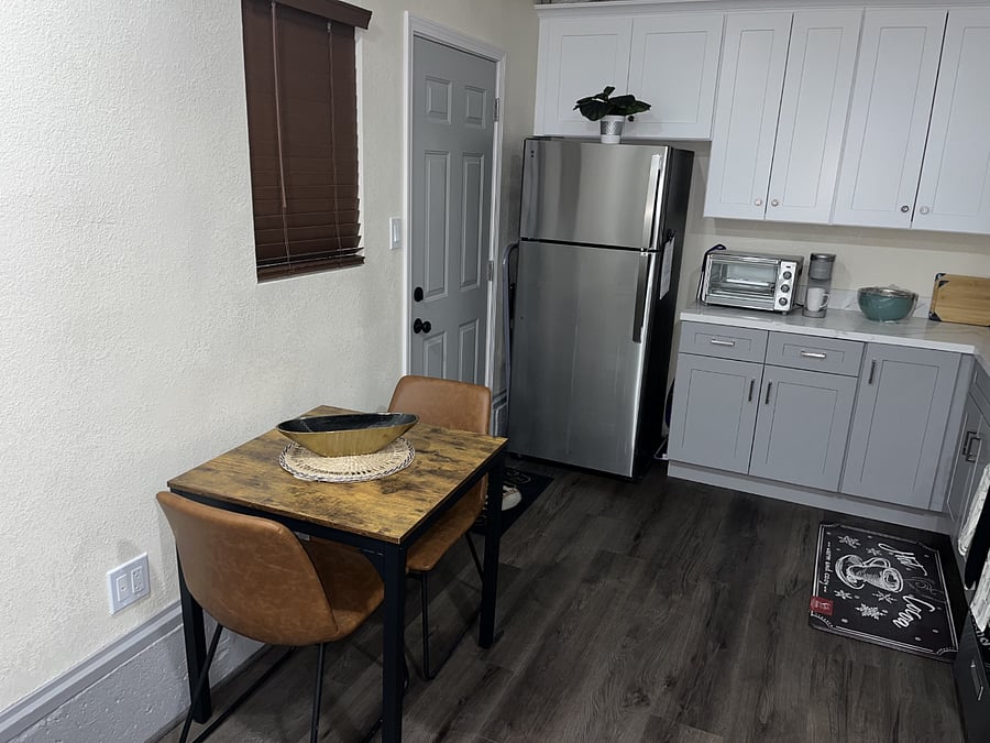 Kitchen & dining area & other entrance.