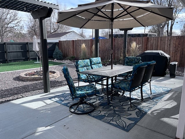 Huge backyard with gas grill and tons of seating.  Yard is fully fenced with a 6 ft. privacy fence