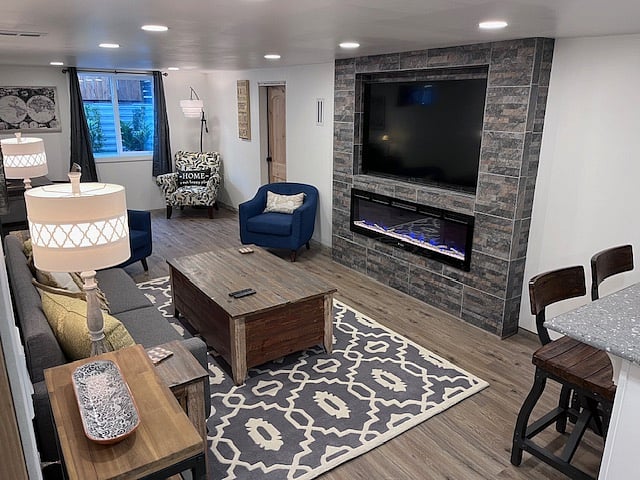 Built in 65" Smart TV and electric fireplace with heat option