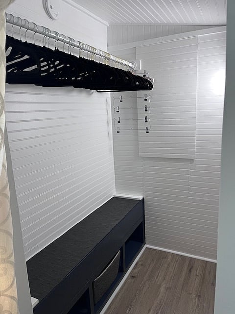 walk-in closet with velvet hangers
