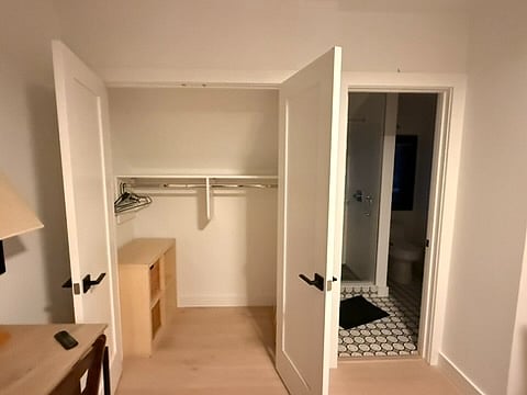 Interior of closet and bathroom door 