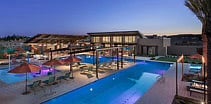 Heated pool! Lap pool and kiddie pool. Gas grills available. TVs also available poolside 