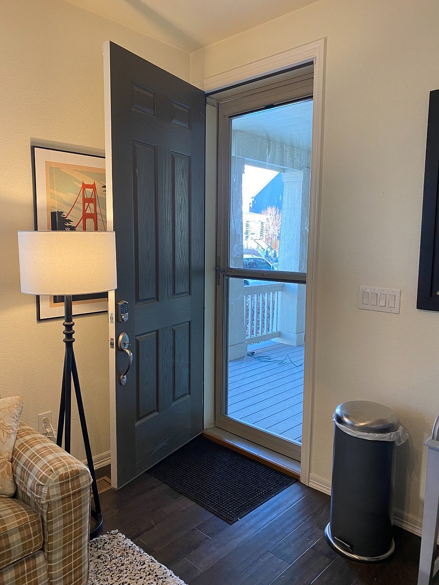Front door with locking storm door for added comfort and security.