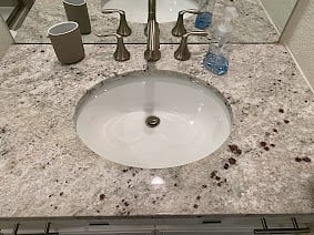 Lovely marble countertop in bathroom.